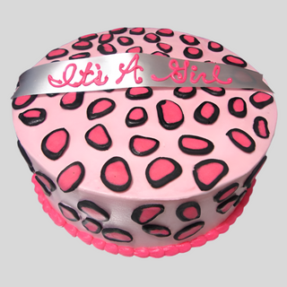 Cheetah Pink is a custom birthday cake featuring black and dark pink leopard spots, finished with a silver ribbon that says "It's A Girl" in pink icing—a delightful pick from our Specialty Birthday Designs collection.