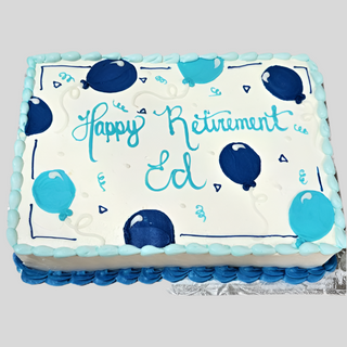 Balloon Party: A rectangular sheet cake with blue and teal balloons and swirls, light blue borders, and "Happy Retirement Ed" in blue icing. Served on a foil-covered board—ideal for any celebratory Balloon Party event.