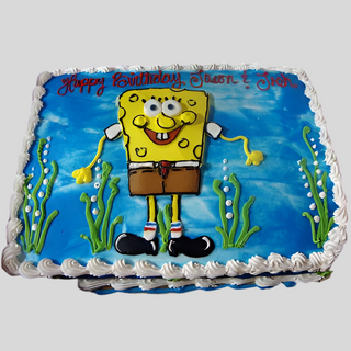 The SpongeBob Ocean cake is a rectangular custom treat with a blue background, white frosting border, and a cartoon SpongeBob Ocean design. “Happy Birthday Jason & Josh” is written in red icing—ideal for any kids’ celebration!.