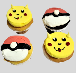 Pokemon Cupcakes: Four custom treats with colorful icing—two featuring yellow Pikachu faces and two decorated as red, white, and black Poké Balls—perfect for kids and arranged on a light gray background.
