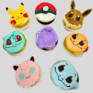 Seven "Pokemon Characters" cupcakes—Pikachu, Poké Ball, Eevee, Bulbasaur, Ditto, Charmander, Jigglypuff & Squirtle—arranged in a circle on a plain background. Ideal for kids and custom cake parties!.