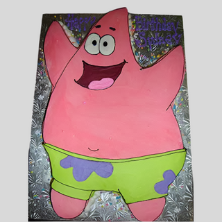 A SpongeBob Friend custom cake shaped and decorated like Patrick Star, featuring a big smile, green shorts, and outstretched arms on a silver-patterned board—perfect for kids’ birthdays!.