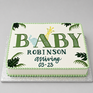 The "Baby Safari" custom cake is rectangular with green leaf accents, jungle animals like a giraffe and elephant in the lettering, and reads: BABY ROBINSON arriving 03-23—perfect for a baby shower.