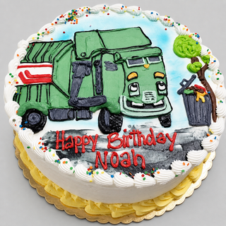 Trash Truck Drawn birthday cake features a cheerful green garbage truck, trash bin, and tree. "Happy Birthday Noah" is written in red icing, with colorful sprinkles and white piped frosting on top.
